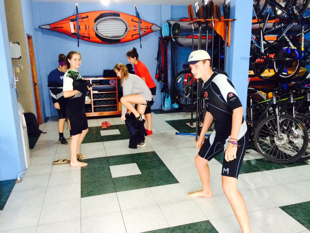 Wetsuit fitting session before our day at Kicker Rock.